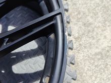 Up close pic of the curb damage. 