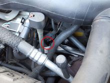 There is a small pool of coolant here and beneath the car.
