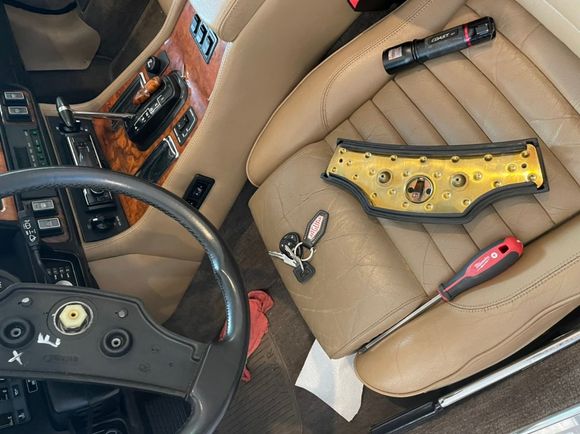 Horn pad detached by removing two small screws from the back.  It’s easier to access the screws after telescoping the wheel out to its full extension 