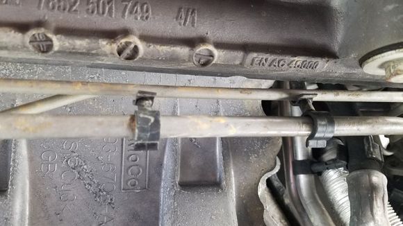 Clip on the left is broken (see back side).  The one on the right is what is should look like.  The 2 clips that take a majority of the load were broken.