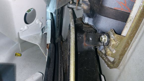 this is looking up and the lock cylinder rod is in this black box tube thing,  and i never saw it in any other removal videos