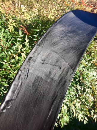 Gloss black enamel and 100 grit. Rinse and repeat.