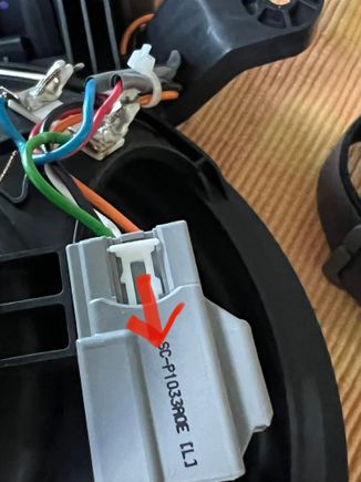 Easily done by releasing and pushing forward on the side tabs that hold it in place