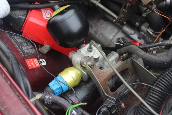 The Brake Pump on a 1989 XJS V12
The Braided Pipe is the Brake Fluid Feed into the Brake Pump from the Reservoir.