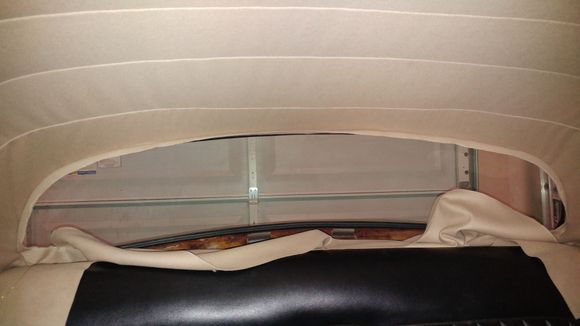 I installed the lower part of the headliner ( just above the back seat) as a separate piece, you can't tell with the package shelf installed.  If you remove the rear window, this is probably not necessary.