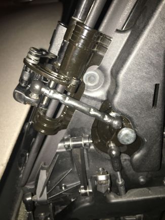 This rod with two ball joint ends controls the flaps. The ball screw on the right worked it’s way loose. The flap would not close and would get jammed with the top upon opening