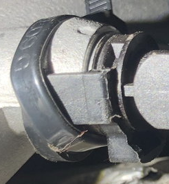 The connector that is attached to the Engine Coolant Outlet Flange (AJ814053)