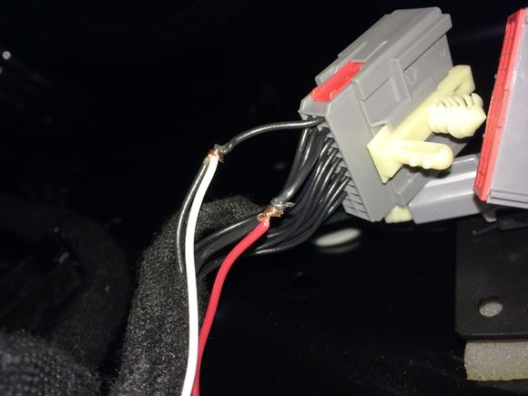 This is right before I soldered and insulated. Notice how everything lays back in the factory direction and the integrity of the factory wires are not compromised.