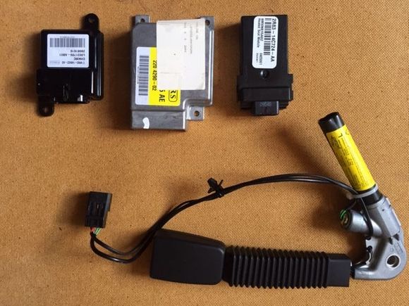 Modules and seat belt pretensioner.