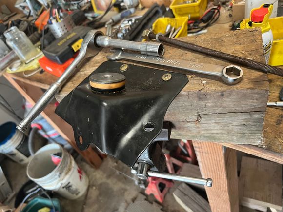 Used threaded rod to compress isolators. 