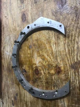 The conversion does not need an expensive adaptor.  That is something you can do yourself in one easy morning. 
  The “trick” is Jaguar made alignment easy because the alignment of a Chevy Bellhousing ( needed to bolt the transmission to the Jaguar block is already done )
      The bolts only serve as a clamping force 
Ask I’ll walk you through the process.  