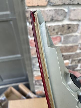 I think this adhesive is visible around the part Sean sent though I want fresh eyes on all these to come to a good conclusion on how this is put together in order to help take it apart😀