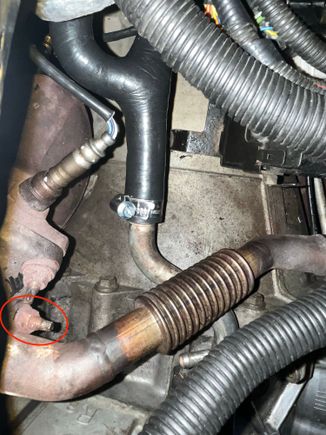 However, I'm can't get ANY purchase on this damn bolt (circled) on the other side of that flange to be able to remove the EGR pipe. Does anyone have any idea what tool and what angle would best help here? I have tried socket-wrenches, spanners, off-set spanners, and none seem to work for me. Either they collide with the damn pipe and cannot grip the bolt, or I cannot apply any torque to the tool if it's somehow able to grip the bolt.