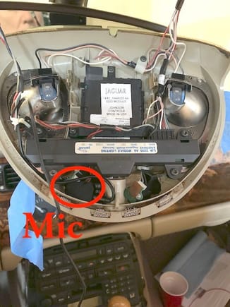 Location of the microphone in header console.  Cable run in front of header, down interior of A-pillar, across the top of the driver footwell into the console.