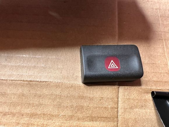 This is what the button covers look like I think you can carefully pry them off with a little curved pic without taking the switch pack apart. Whereas the white inner buttonYou have to take a pack apart and take it out from the back