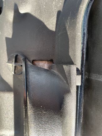 This is a down shot standing directly over the scoop, looking down at the radiator cover and scoop. This is on the passenger side or right side if you look where the cover meets the scoop it overlaps and it looks like the cover piece should go on top of the scoop, but there’s too much material there on the scoop and it interferes