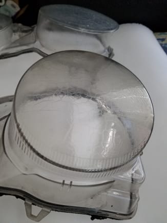 As you can see it's pretty severe, and it's on both headlights. It's not all the way through the plastic, so I guess that's a plus.