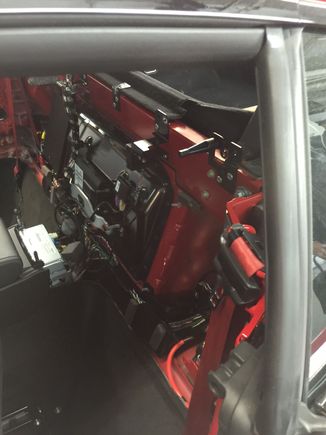 Again behind driver seat.