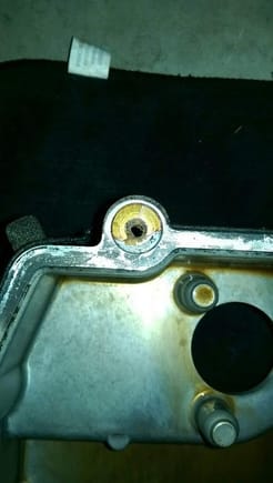 Oil pan side of the broken bolt.