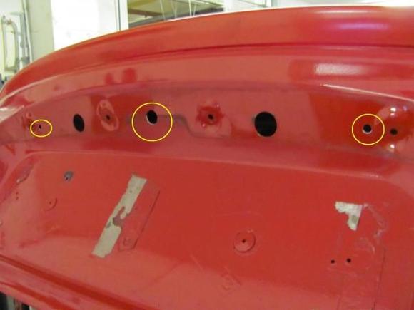 Drilling all holes including the middle grommet hole