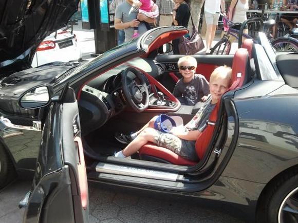 My 2 boys in a new 2014 F type. Maybe they'll be able to buy a used one by the time they can drive?!