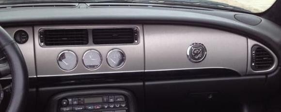 image brushed titanium vinyl wrap with piano black details. Chrome trim.