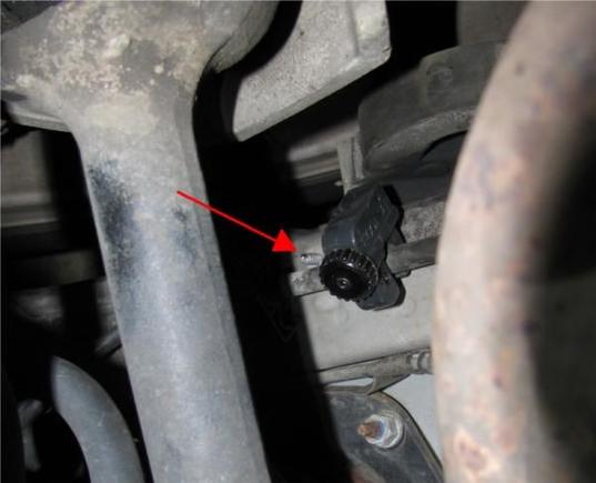 Cutting into the fuel line to insert the check-valve.