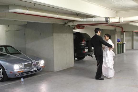 Practicing the bridal waltz in the car park