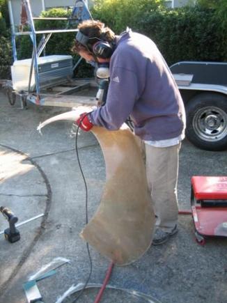 9
Here, little Bro helps with the trimming and shaping of the wheel arch on the driver side rear quarter panel.  we both itched for weeks after this project!