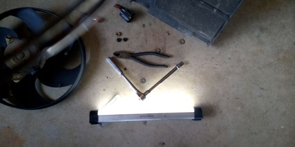 Light, 10mm socket and wire cutter for the zipties