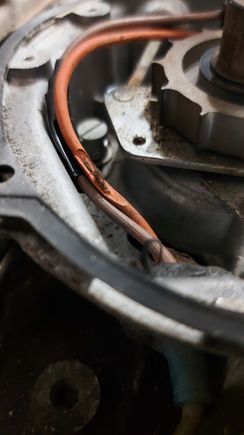 Found that the two wires in the distributor were damaged. 