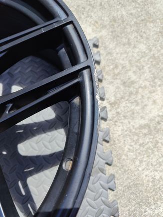 Up close pic of the curb damage. 