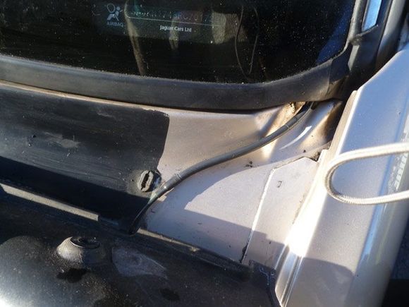 Windscreen corner with plastic plenum cover removed. Clean.