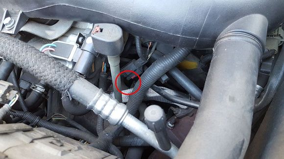There is a small pool of coolant here and beneath the car.