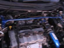 engine photo 4 cyl. 2.0 liter cold air.muffler,and a body kit by h&amp;r racing.and after market strut bar