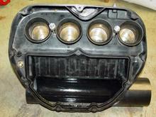 Suzuki velocity stacks installed inside the air box.