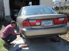 '98 Mazda Protege, he's fixing the brakes first time.