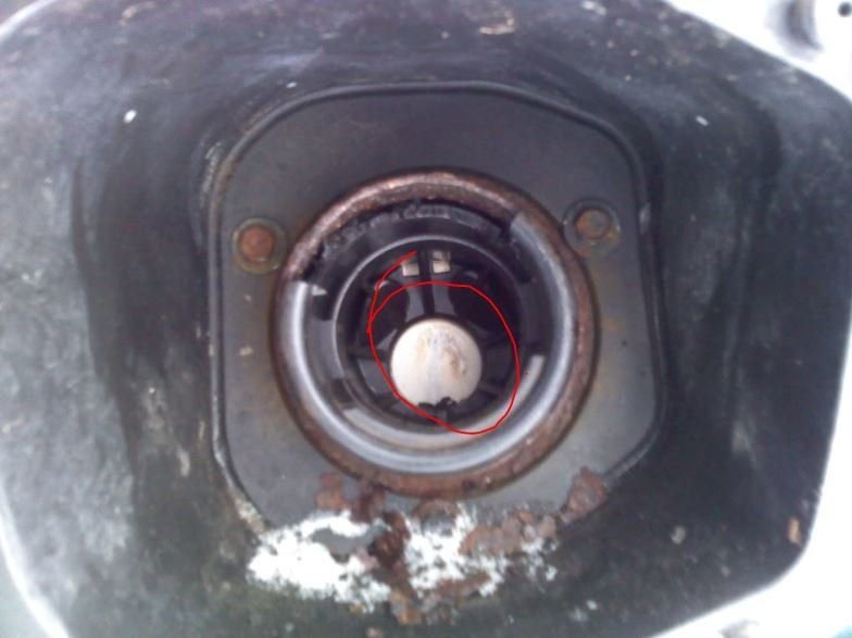 Do you have a metal flap at the gas tank inlet? Mazda Forum Mazda