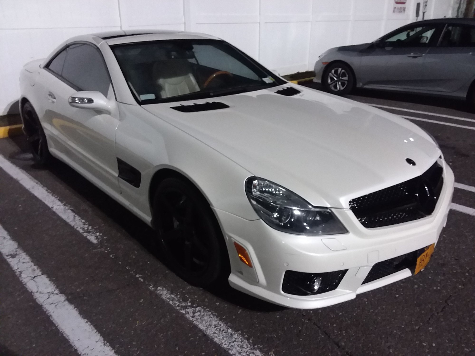 2007 Mercedes-Benz SL550 - 07 SL550 DESIGNO ROADSTER CONVERTED 2011 SL63 AMG BODY-BRAKES-EXHAUST WHITE W/WHITE - Used - VIN WDBSK71F77F133374 - 77,000 Miles - 8 cyl - 2WD - Automatic - Convertible - White - Syosset, NY 11791, United States