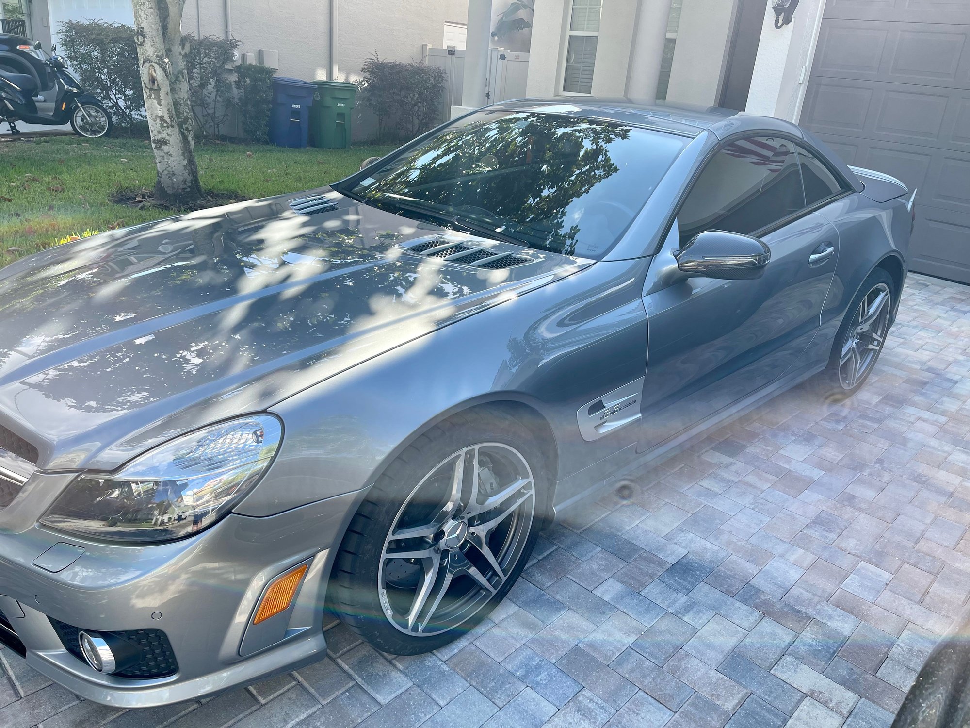 2009 Mercedes-Benz SL63 AMG - Impeccable condition 2009 SL63 AMG with low miles (P030 option car) - Used - VIN WDBSK70F59F145639 - 34,829 Miles - 8 cyl - 2WD - Automatic - Convertible - Silver - Tampa, FL 33611, United States