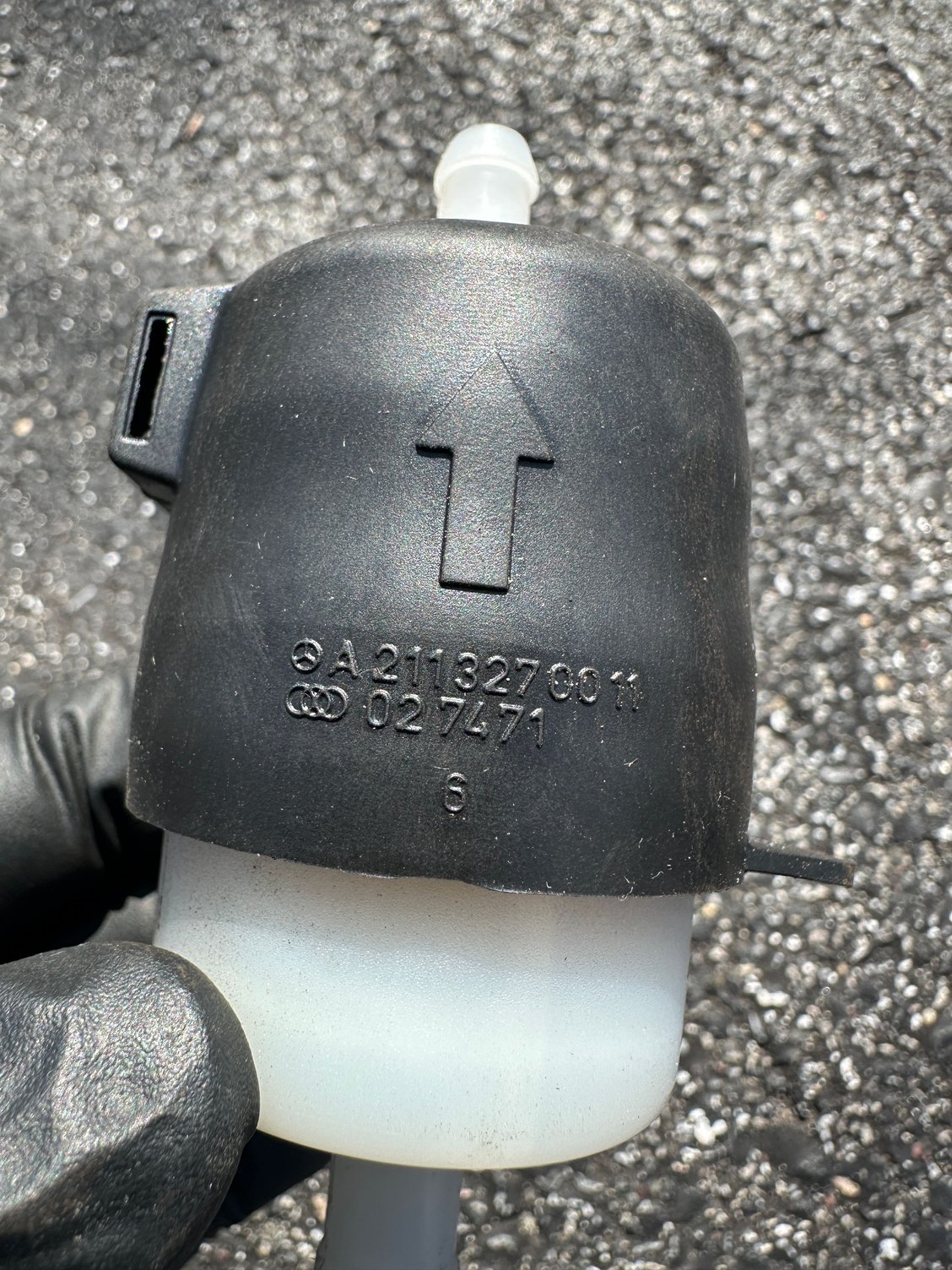 Air filter and boot removed from the car.  Shows the MB part number for the boot.