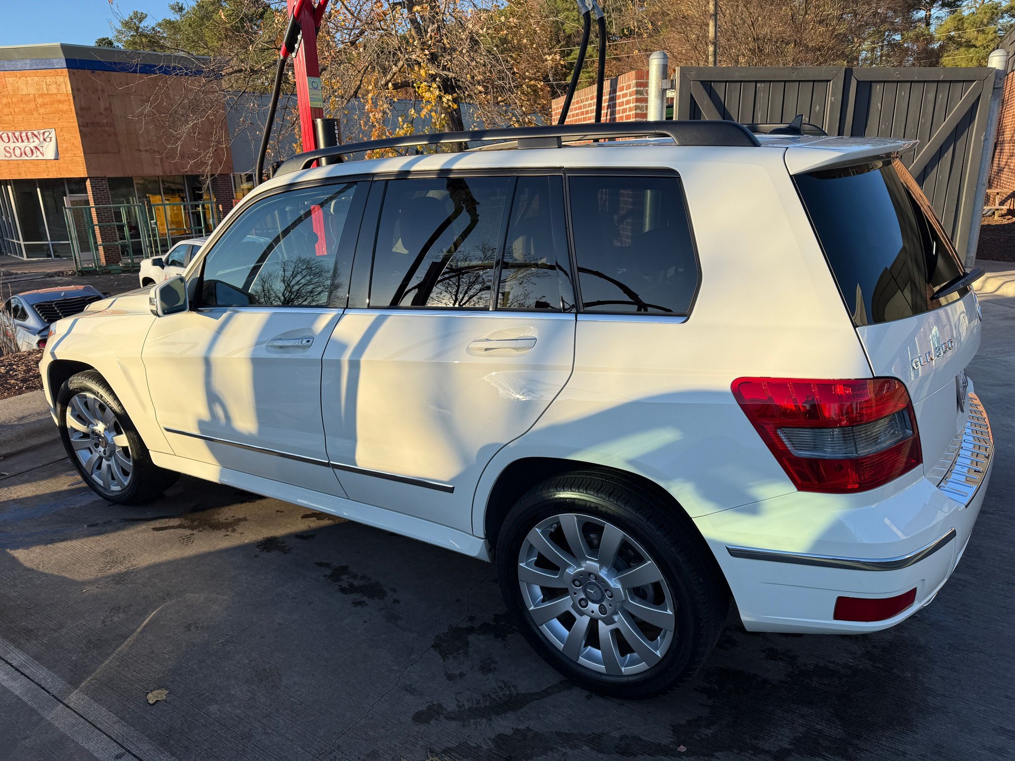 Rear 3/4 view at the car wash. 