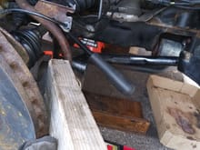 Proximal shaft wouldn't seat by hand. Lining up the axle as much as possible and tapping it with a heavy hammer with wood in-between worked. Disassembling the suspension for axle removal was minimal as the shock was out.