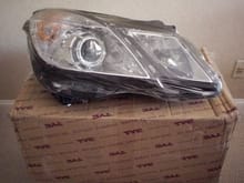 Left and right Halogen headlights for your E series. In original box with shrink wraping.