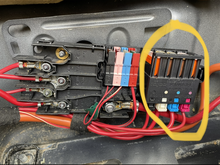 Check for loose connectors or fuses here by the battery. 