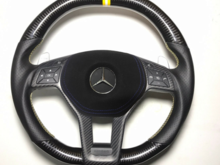 Carbon Fiber gloss finish with double yellow and white chapter ring 'tri ring'
Perforated leather with yellow and white cross stitching.
Matte/Glossy central carbon trim piece option
Airbag cover in in alcantara trim option