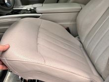 Again. Seat detached and raised. There are a few connectors keeping me from totally removing the seat bottom. I have ventilated seats. No need to disconnect. This is enough room to remove the hidden screws. 