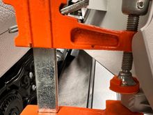 Gluing the part of the seat trim that came loose. 