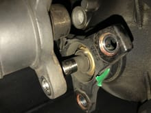 Transmission driveshaft bearing