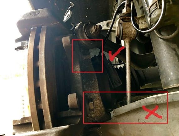Rear brake caliper support removal.
